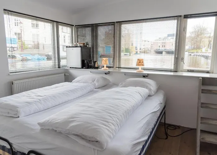 Houseboat Next To Amstel Amsterdam